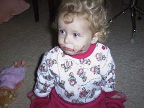 Amelia and lipstick 4 July 99 - 2.JPG